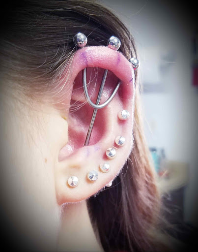 Explore front neck tattoo ideas, creative tattoo ideas in Nevada, available at Generation X Tattoos and Piercings
