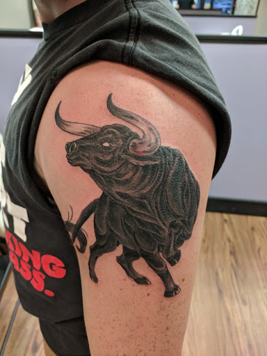 Explore african tattoos ideas, creative tattoo ideas in New Hartford, available at Bodily Charm Tattoo & Piercing