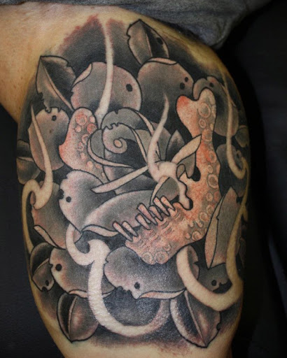 Explore cartoon tattoo ideas for men, creative tattoo ideas in Erie, available at Wayward Tattoo Studio