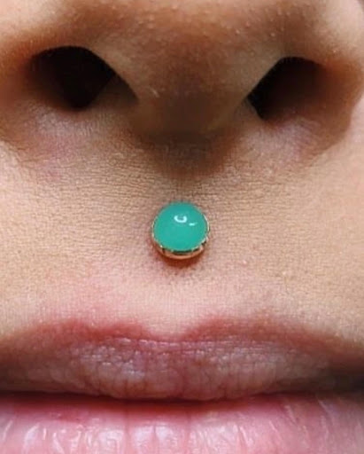 Explore skiing tattoo ideas, creative tattoo ideas in Chicago, available at Identity Body Piercing