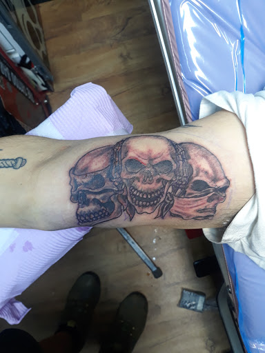 Explore chiefs tattoo ideas, creative tattoo ideas in Fort Worth, available at Randy Adams Tattoo Studio