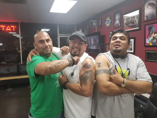 Explore hand tattoo ideas for guys, creative tattoo ideas in Fountain Valley, available at Lowrider Tattoo Studios
