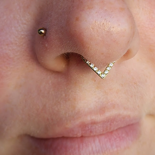 Explore safety pin tattoo ideas, creative tattoo ideas in Kokomo, available at Beatnik piercing & jewelry