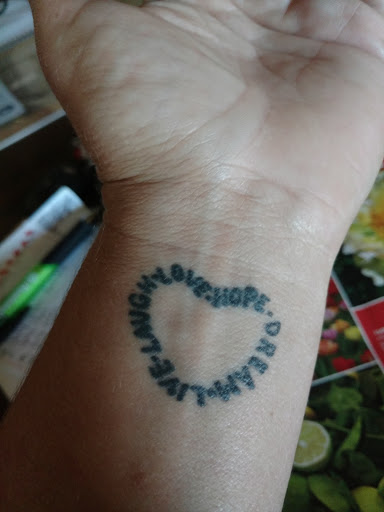 Tattoo Shop «American Outlaw Tattoo», reviews and photos, 164 Park Ave, Amherst, OH 44001, USA