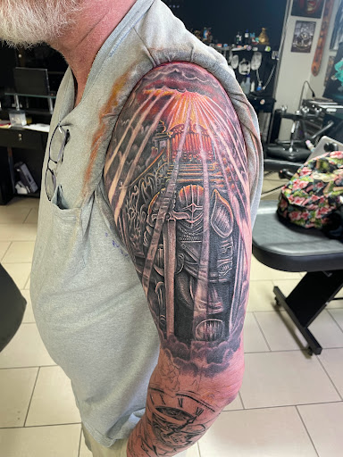 Explore chin tattoo ideas, creative tattoo ideas in Sarasota, available at SEVEN SINS Tattoo Studio