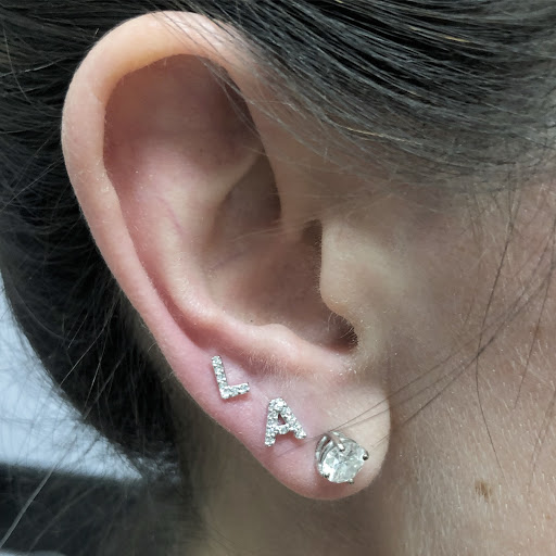 Explore cover up black tattoo ideas, creative tattoo ideas in White Plains, available at Addicted To Ink