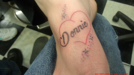 Explore upper arm tattoo ideas for men, creative tattoo ideas in Mount Airy, available at Big Daddy Ds Tattoos