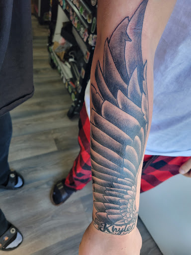 Explore massage therapy tattoo ideas, creative tattoo ideas in Toledo, available at Inked by Chris