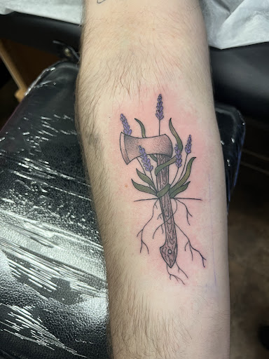 Explore cool leg tattoo ideas for guys, creative tattoo ideas in Red Bank, available at Resilient Visions