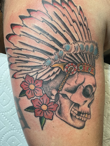 Explore banksy tattoo ideas, creative tattoo ideas in Mount Juliet, available at Division Street Tattoo Company