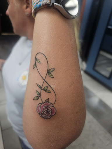 Explore daughters name tattoo ideas for dad, creative tattoo ideas in Foley, available at Symbolic Ink Tattoo Studio