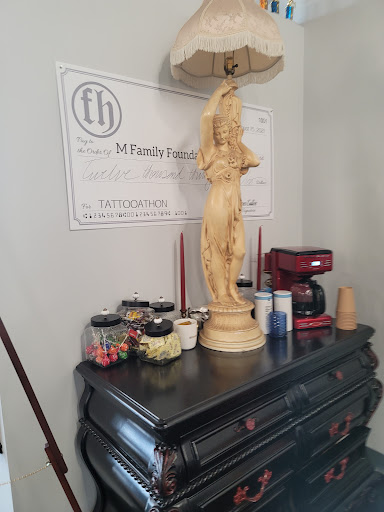 Explore cover up tattoo ideas for men, creative tattoo ideas in Kissimmee, available at Fallen Heroes Tattoo & Piercing (Florida)