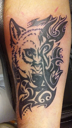Explore split personality tattoo ideas, creative tattoo ideas in Anniston, available at Wicked Game Tattoo & Piercing Studio