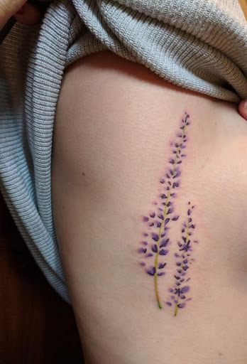 Explore tulip tattoo ideas, creative tattoo ideas in Nampa, available at Temptation Tattoo & Body Piercing
