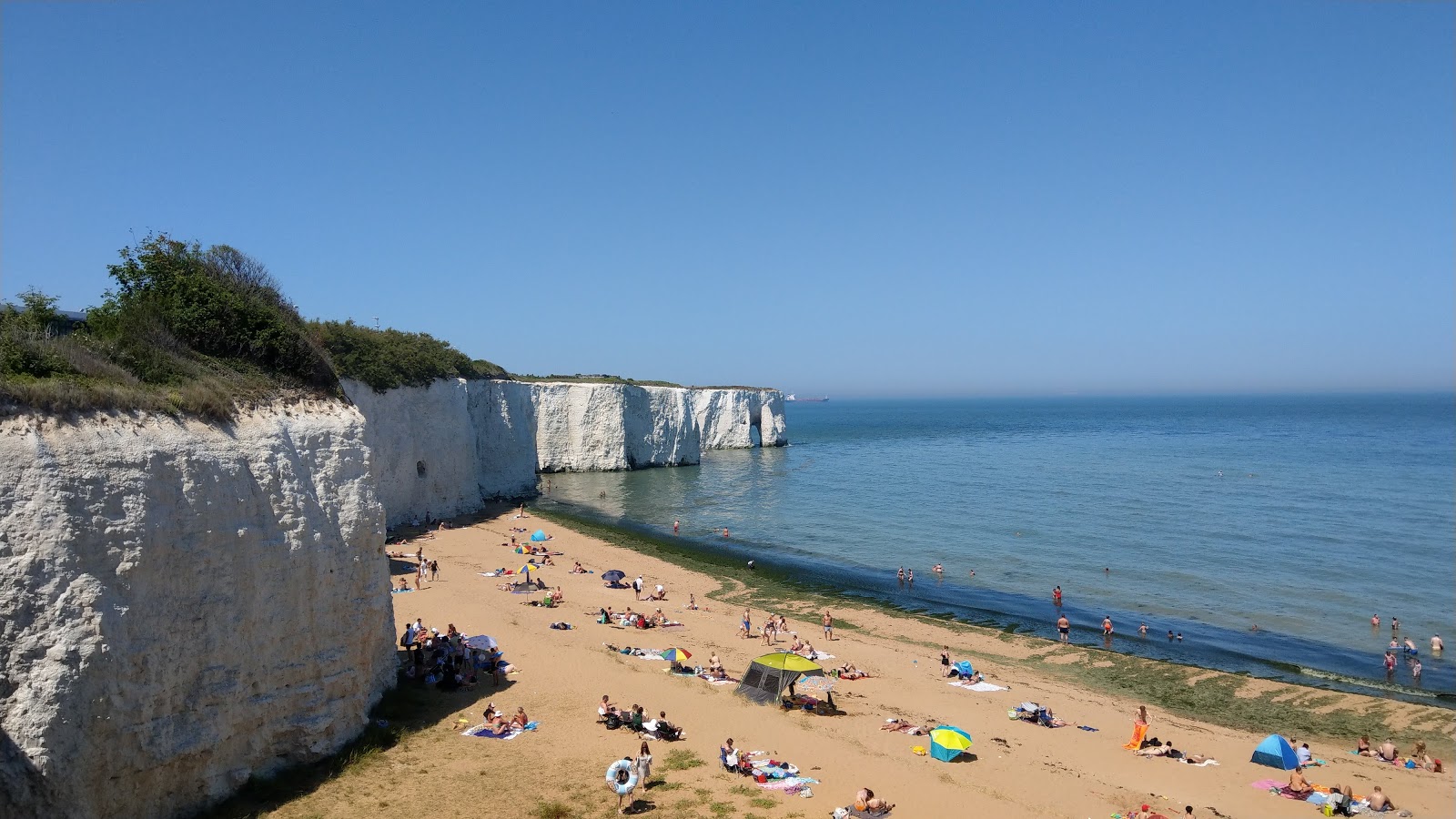 Foto von Kingsgate Bay beach mit beiger sand Oberfläche