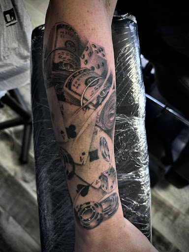 Explore bass clef tattoo ideas, creative tattoo ideas in Ottawa, available at Forever Inked Tattoo Company