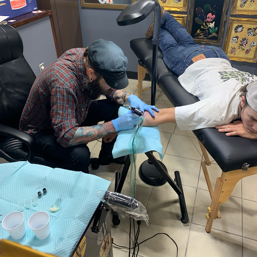 Explore funny tattoo ideas for men, creative tattoo ideas in Tulsa, available at Electric Gnome Tattoo