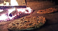 Plats et boissons du Pizzas à emporter Pizza au feu de bois GUIDO à Nîmes - n°6