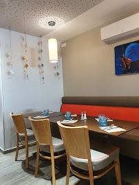 Atmosphère du Restaurant de fruits de mer Restaurant La Maison Du 6 à Arromanches-les-Bains - n°12
