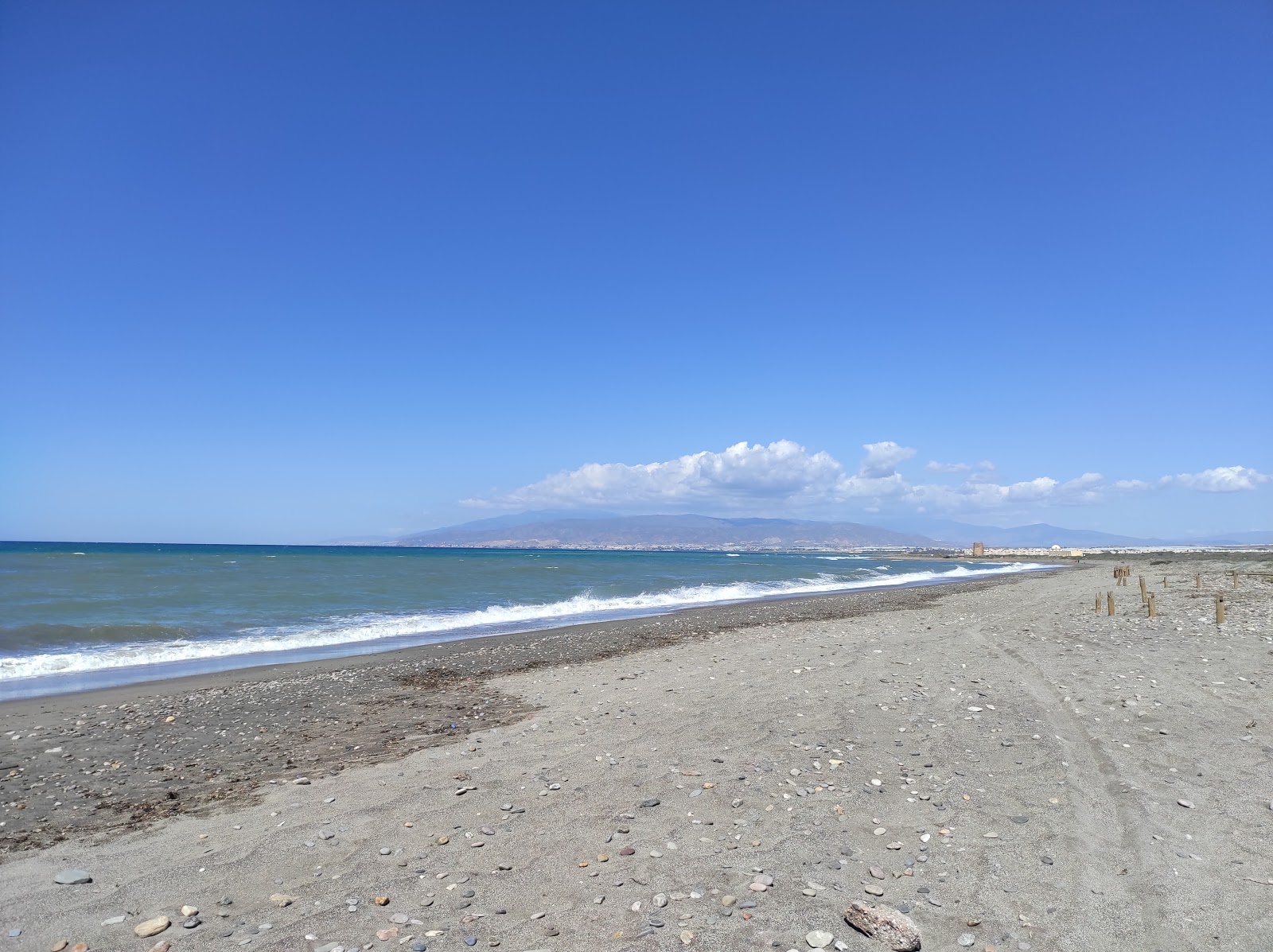 Foto di Playa de Torregarcia con una superficie del sabbia grigia e ciottoli