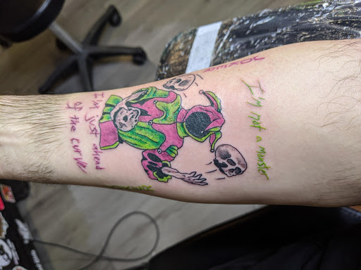 Explore hand cover up tattoo ideas, creative tattoo ideas in Augusta, available at True North Tattoos and Piercings