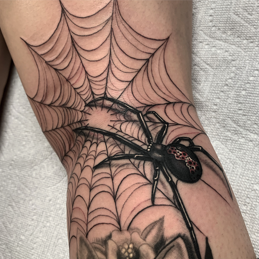 Explore purple flower tattoo ideas, creative tattoo ideas in Danvers, available at North Shore Tattoo Company