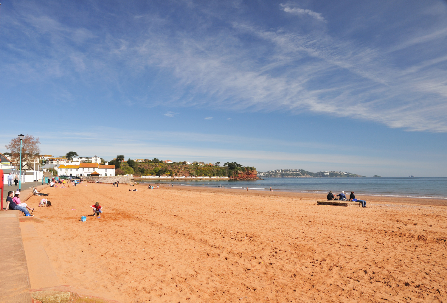 Photo of Goodrington beach with brown sand surface