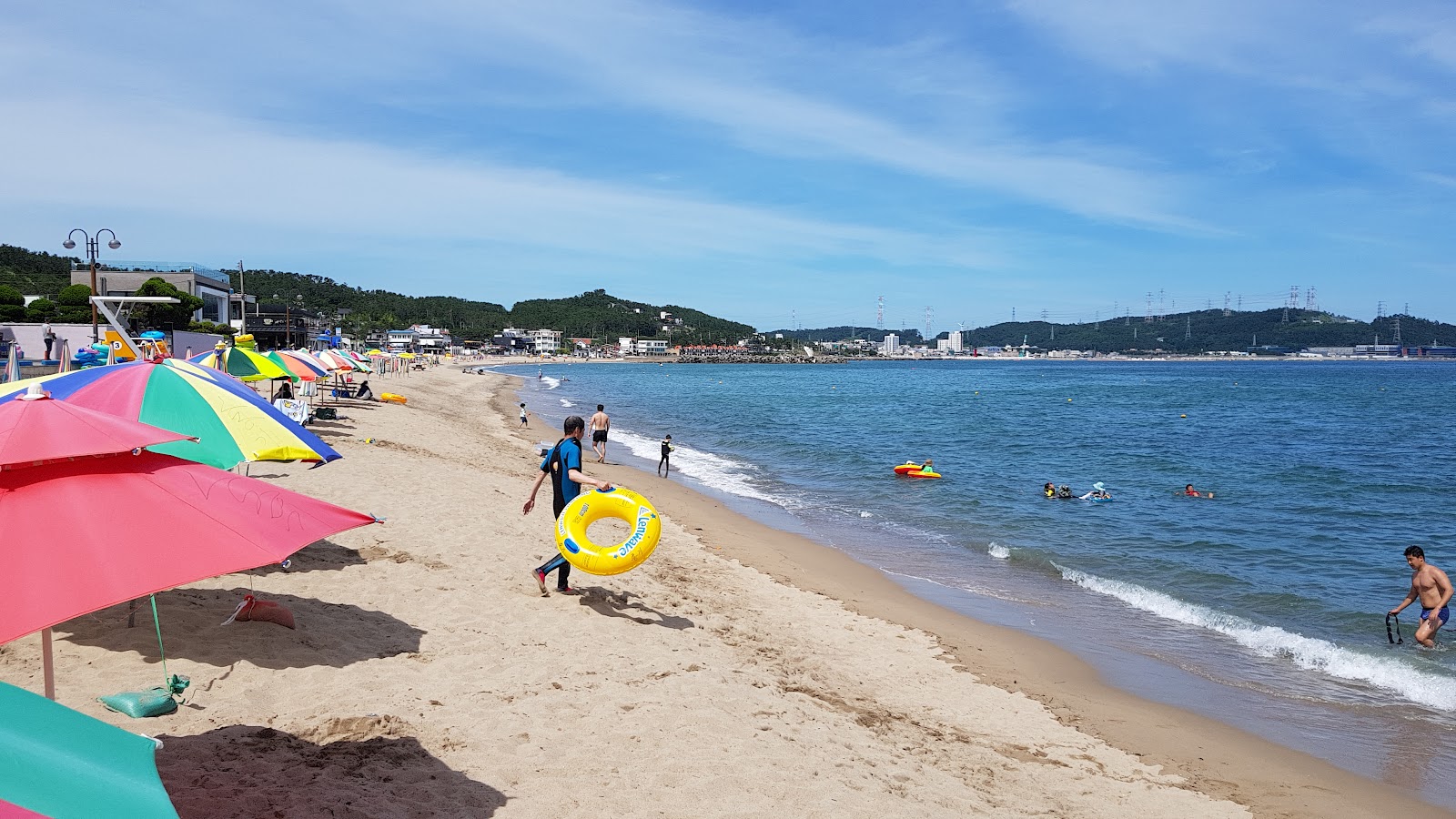 Foto van Imrang Beach met beige zand oppervlakte