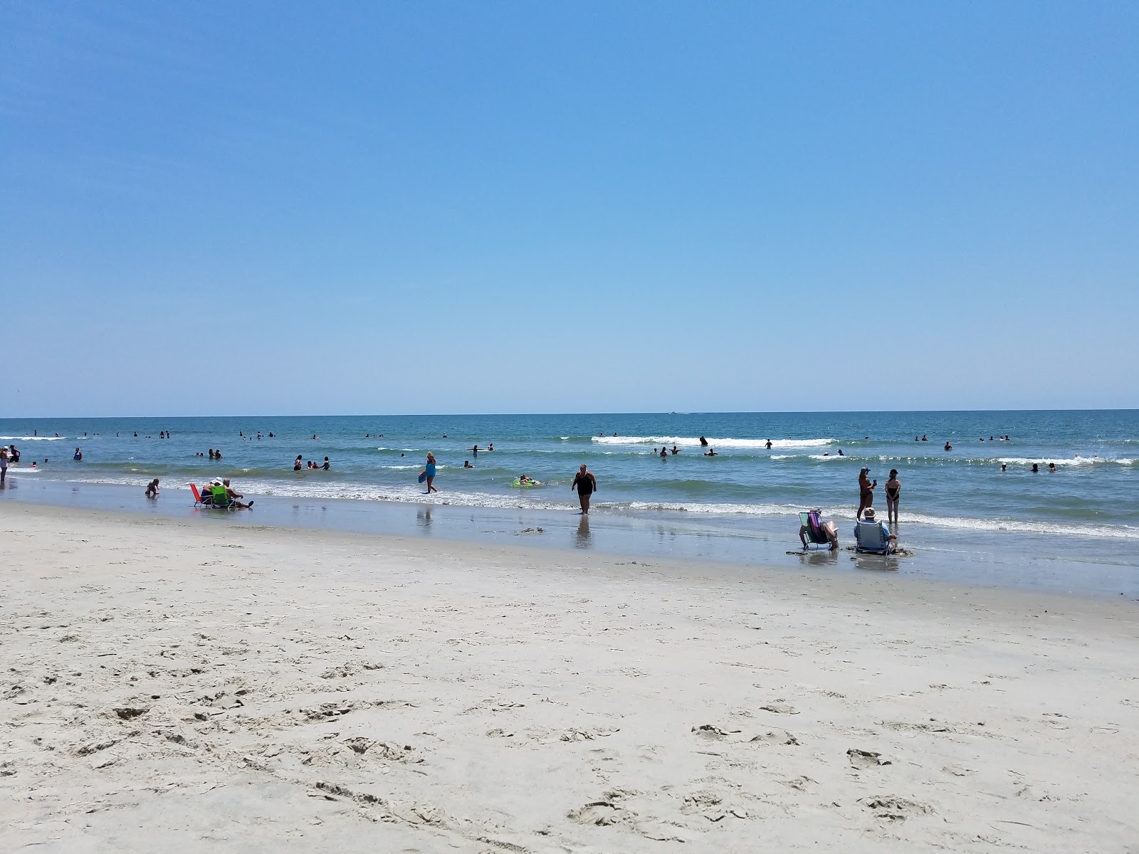Foto di Huntington beach con una superficie del sabbia beige