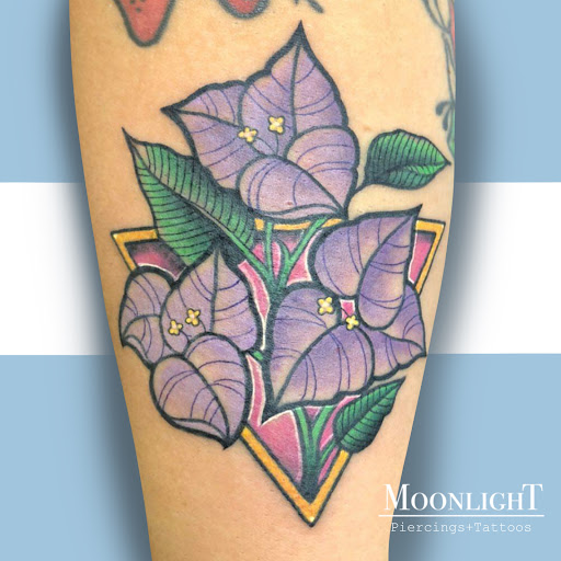 Explore female neck tattoo ideas, creative tattoo ideas in Houston, available at Moonlight Piercings & Tattoos Studio