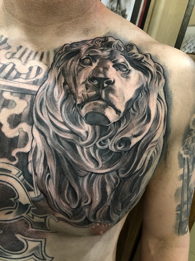 Explore strength tattoo ideas for females, creative tattoo ideas in Fountain Valley, available at Lowrider Tattoo Studios