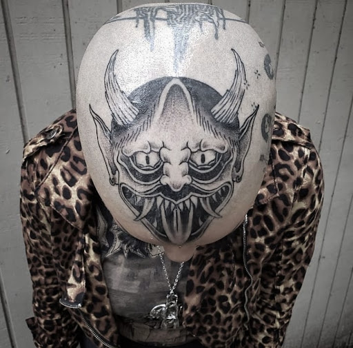 Explore animal skull tattoo ideas, creative tattoo ideas in New Orleans, available at Downtown Tattoos and Piercing