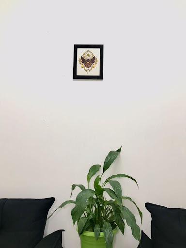 Logo da empresa - Uzi Tattoo