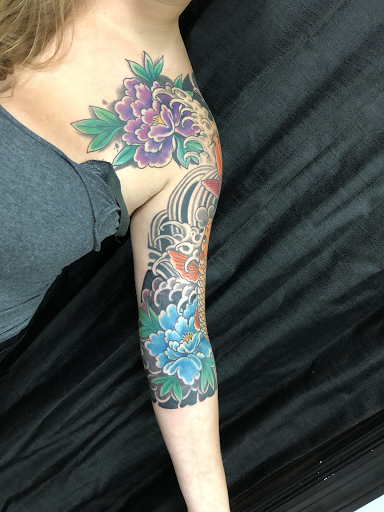 Explore gothic hand tattoo ideas, creative tattoo ideas in Jacksonville, available at Idle Hands Tattoo Co.