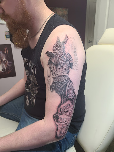Explore fisherman tattoo ideas, creative tattoo ideas in Lagrangeville, available at Black Cherry Tattoo Studio NY