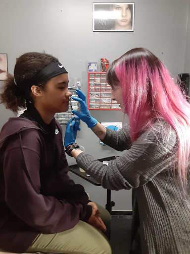 Explore butterfly memorial tattoo ideas, creative tattoo ideas in Kalamazoo, available at SouthPointe Ink - Tattoos and Piercings