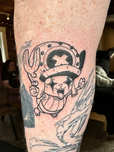 Find tattoo ideas on the chest for your next unique tattoo in Broxton at Seratonin Tattoo Parlor