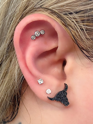 Explore handcuff tattoo ideas, creative tattoo ideas in Springfield, available at Body Piercing By Qui Qui