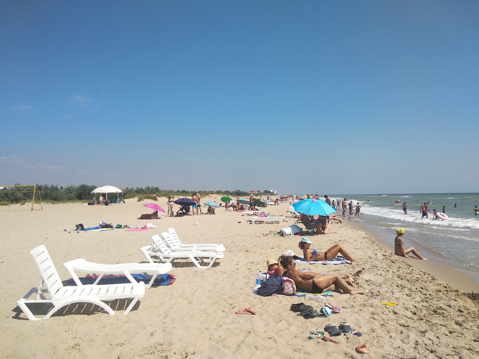 Fotografija Plyazh Karolino-Buhazi z svetel pesek površino