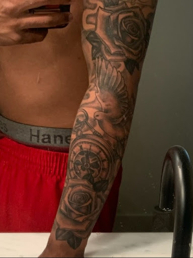 Explore small dog tattoo ideas, creative tattoo ideas in Albany, available at Tat Jones Ruthless Tattoos L.L.C.