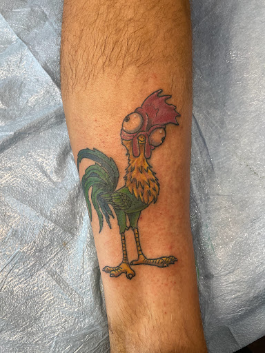 Explore calligraphy tattoo ideas, creative tattoo ideas in Kansas City, available at Golden Stag Tattoo and Gallery