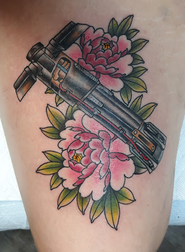 Explore tattoo for son ideas, creative tattoo ideas in Tampa, available at HAWKS ELECTRIC TATTOOS