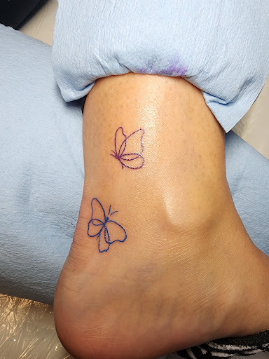 Explore small fine line tattoo ideas, creative tattoo ideas in Puyallup, available at Blvck Widow Ink