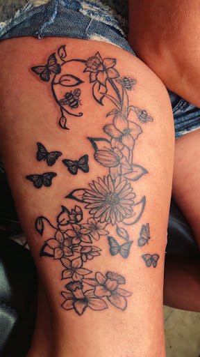 Explore hustler tattoo ideas, creative tattoo ideas in Gadsden, available at Savage City Ink LLC