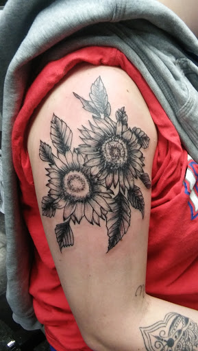 Explore tiger tattoo ideas for men, creative tattoo ideas in Big Spring, available at A Mom & Pop Tattoo Shop