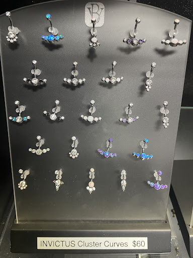 Explore kaws tattoo ideas, creative tattoo ideas in Sarasota, available at Z-Edge Tattoo & Body Piercing South Shop