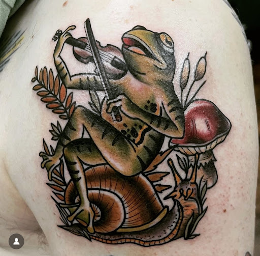 Explore back of shoulder tattoo ideas, creative tattoo ideas in Houston, available at Houston Heights Tattoo & Piercing