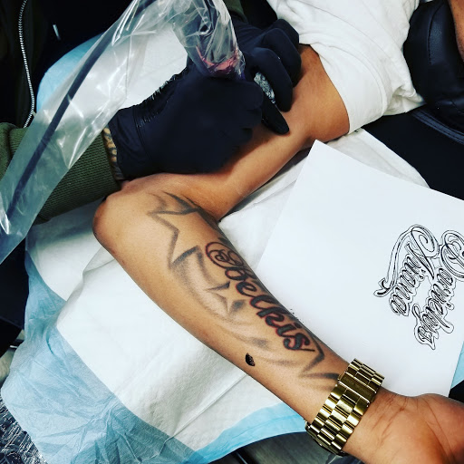 Explore scene tattoo ideas, creative tattoo ideas in Bronx, available at Chuckys Cut Tattoo & Barbershop llc