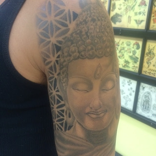 Find tattoo sunflower ideas for your next unique tattoo in Miami at Tattoos by Lou Miami - North Miami