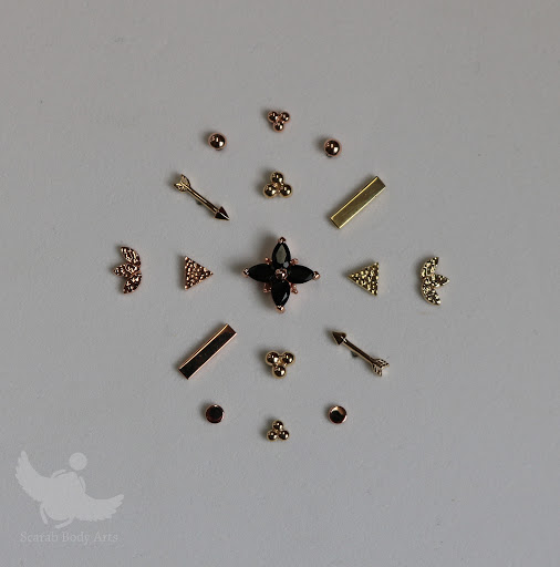 Explore tattoo ideas for roses, creative tattoo ideas in Syracuse, available at Scarab Body Arts